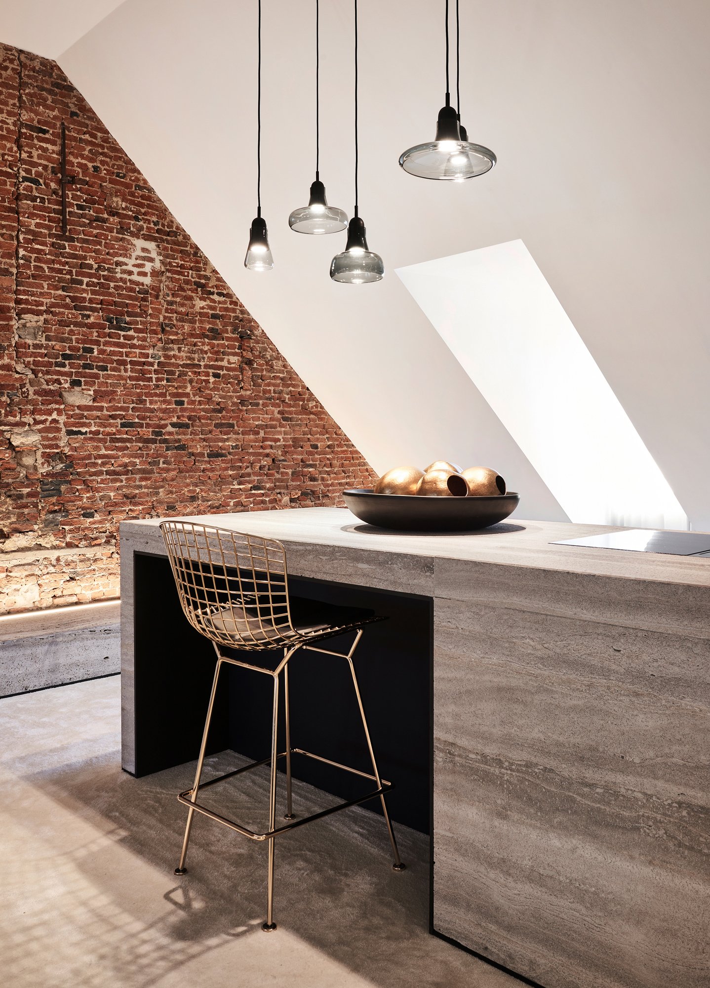 interior design multiple hanging lamps old brick details